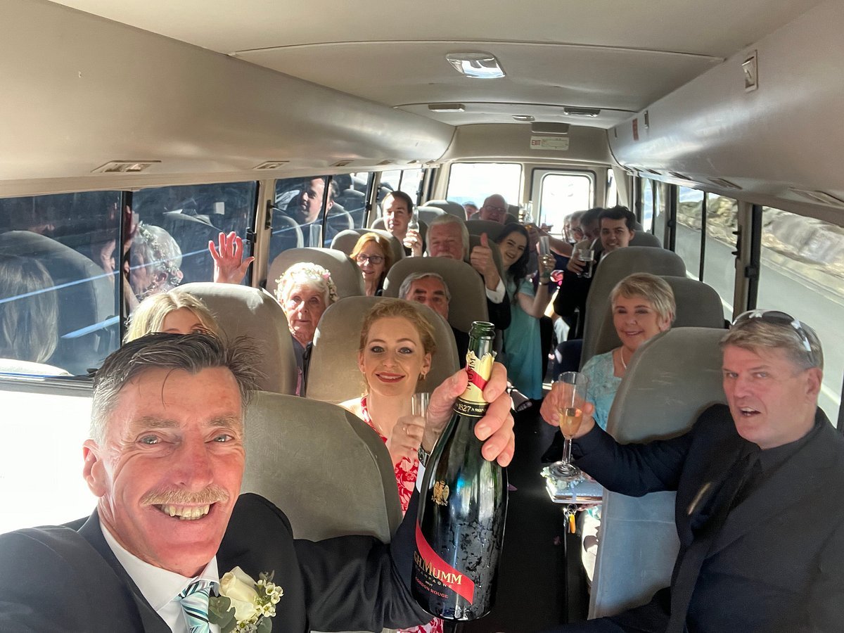 Happy passengers celebrating on the bus